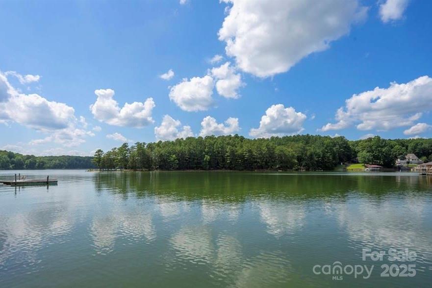 a view of a lake with a yard