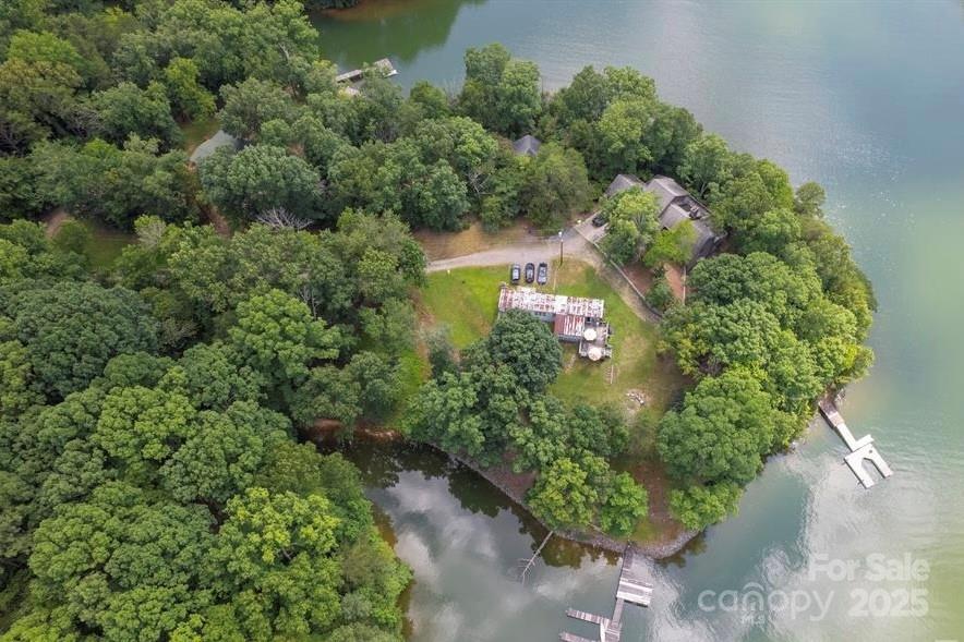120 Saxton Trail Troutman, NC 28166 - Photo 6 of 7 a view of a garden with a tree