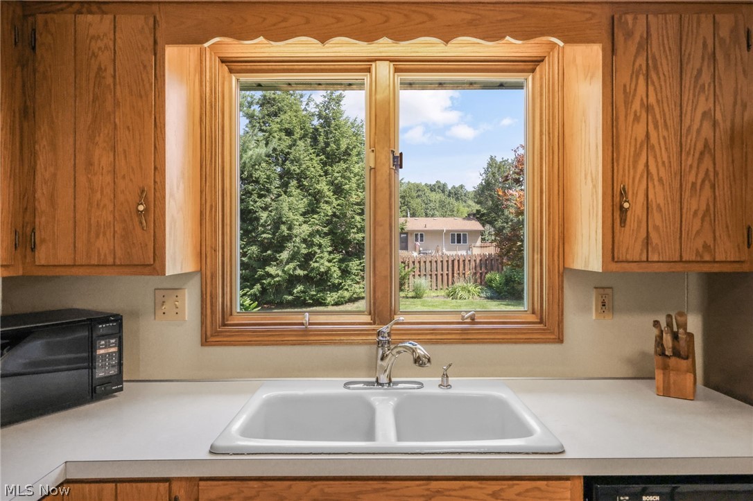 155 Oldman Road Wooster, OH 44691 - Photo 16 of 37 Kitchen with sink and dishwashing machine