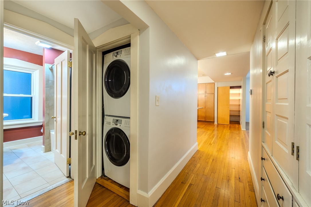 2472 Overlook Road Cleveland Heights, OH 44106 - Photo 13 of 30 Laundry area featuring light wood finished floors and stacked washer / drying machine