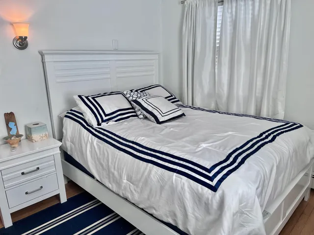 a view of bedroom with furniture