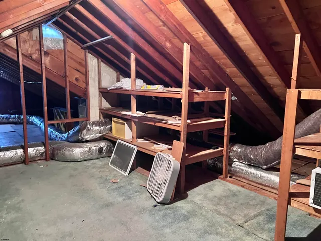 a room with furniture and a fireplace