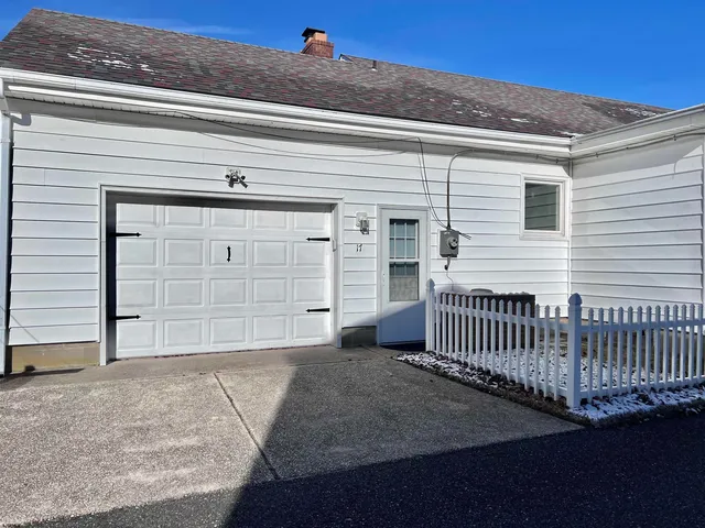 a view of a house with a garage