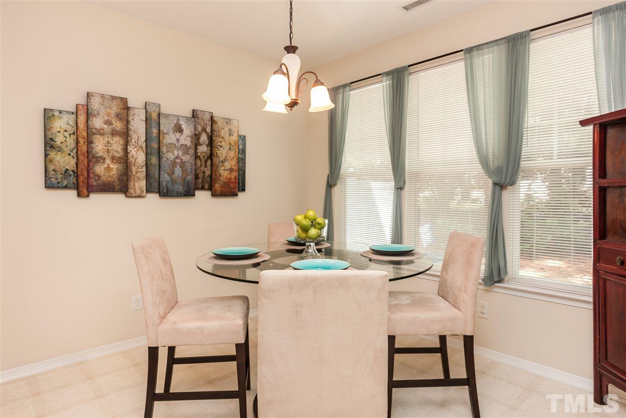 8500 Pillar Gate Lane Raleigh, NC 27613 - Photo 12 of 24 a dining room with furniture and window