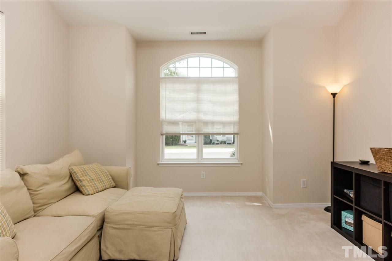 8500 Pillar Gate Lane Raleigh, NC 27613 - Photo 13 of 24 a living room with a bed furniture and a window