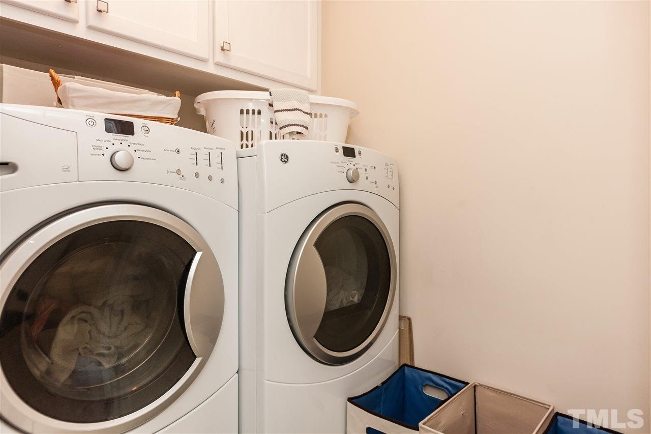 8500 Pillar Gate Lane Raleigh, NC 27613 - Photo 20 of 24 a utility room with dryer and washer