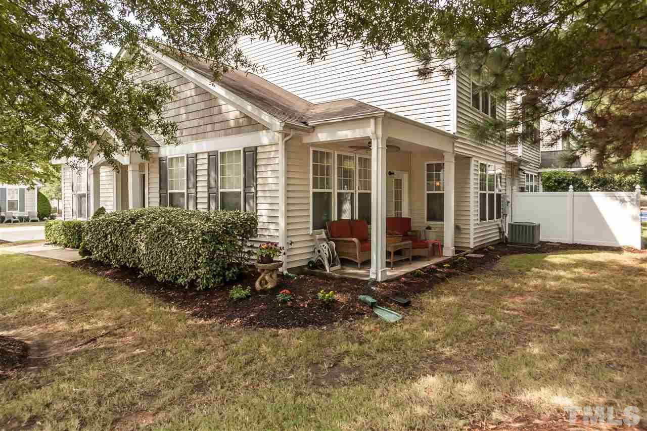 8500 Pillar Gate Lane Raleigh, NC 27613 - Photo 23 of 24 a view of a house with a yard and large tree