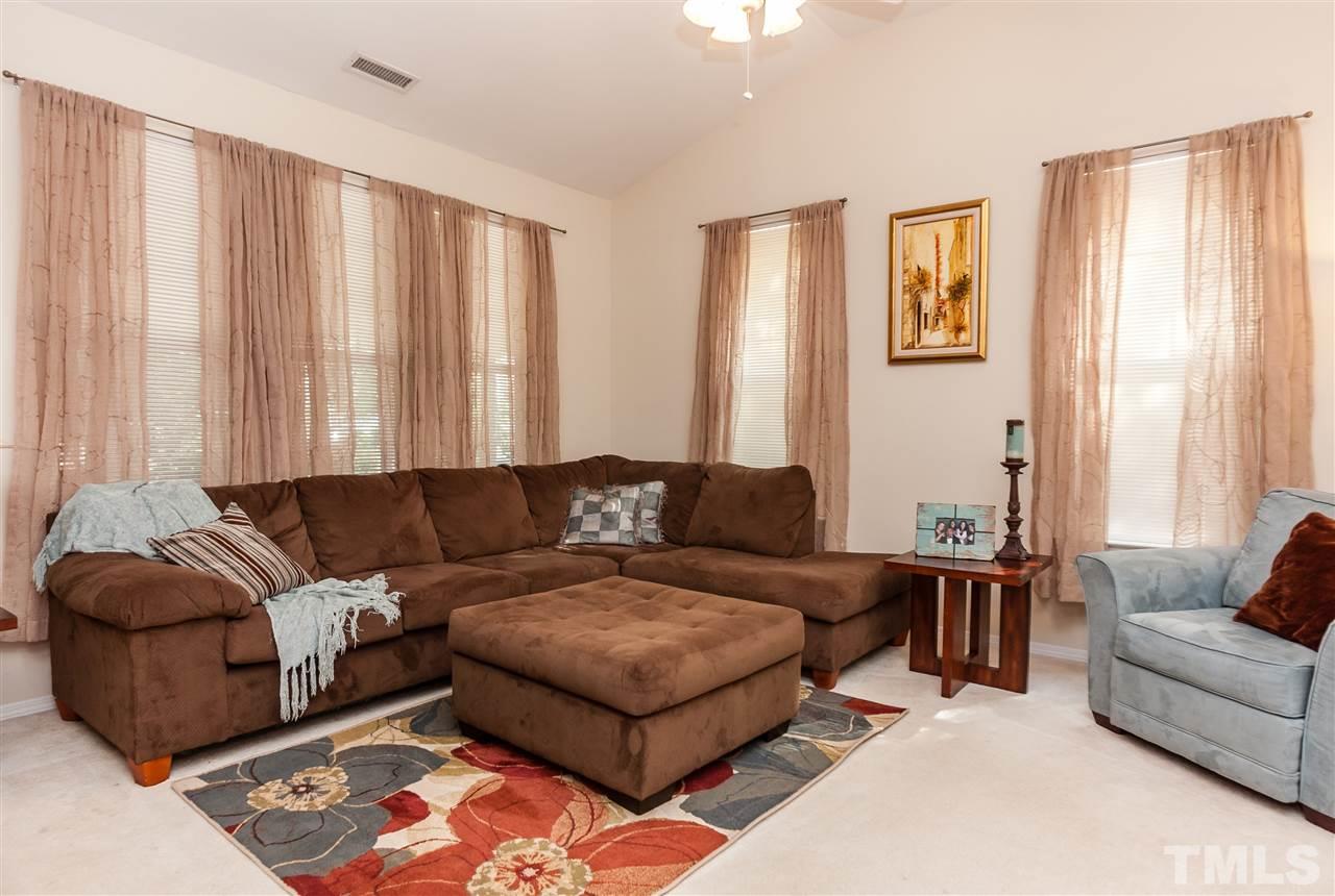 8500 Pillar Gate Lane Raleigh, NC 27613 - Photo 4 of 24 a living room with furniture and a couch