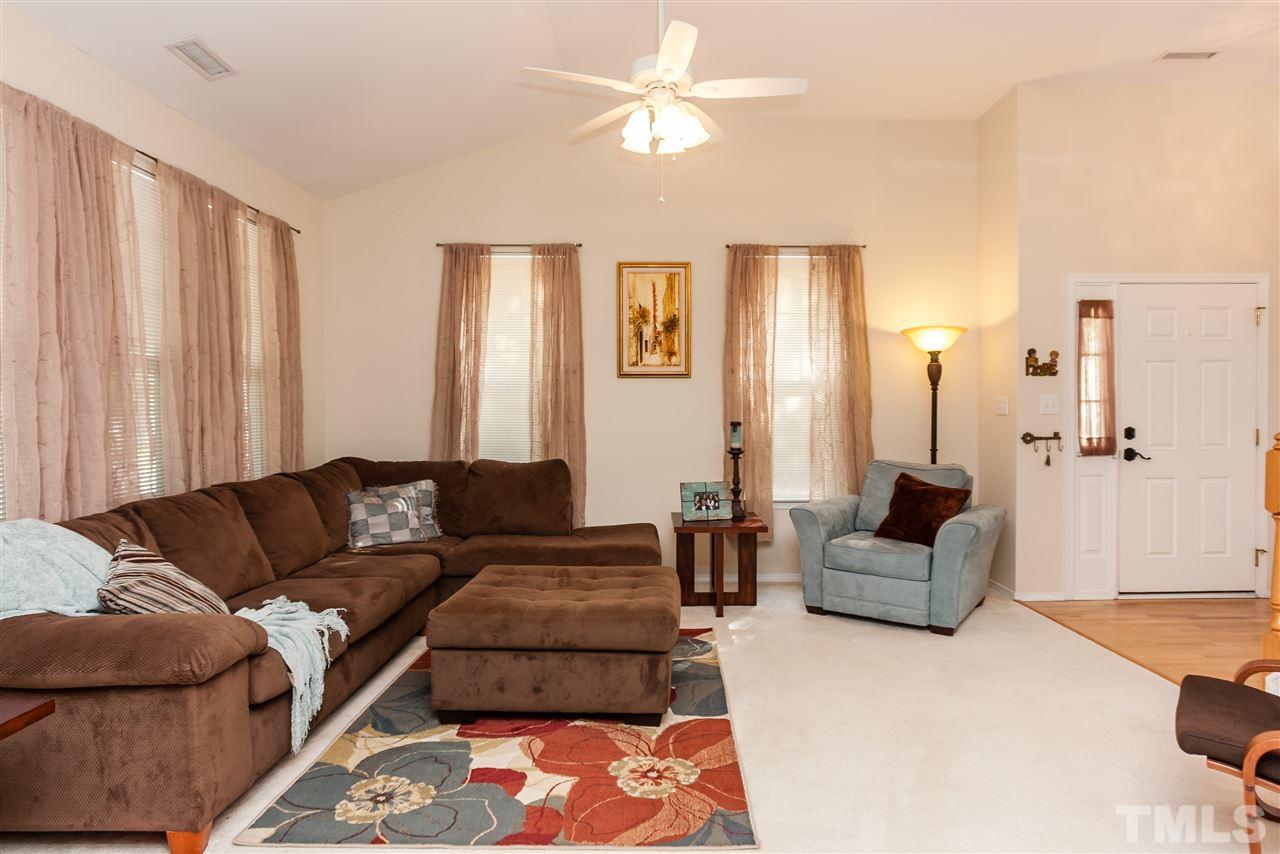 8500 Pillar Gate Lane Raleigh, NC 27613 - Photo 5 of 24 a living room with furniture and a couch
