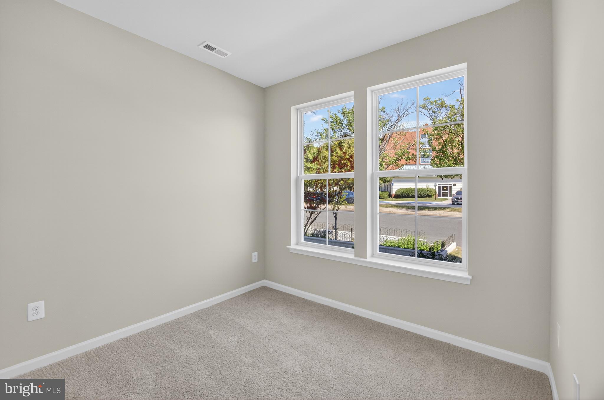 10046 Harper Vale Road Montgomery Village, MD 20886 - Photo 12 of 15 an empty room with a window