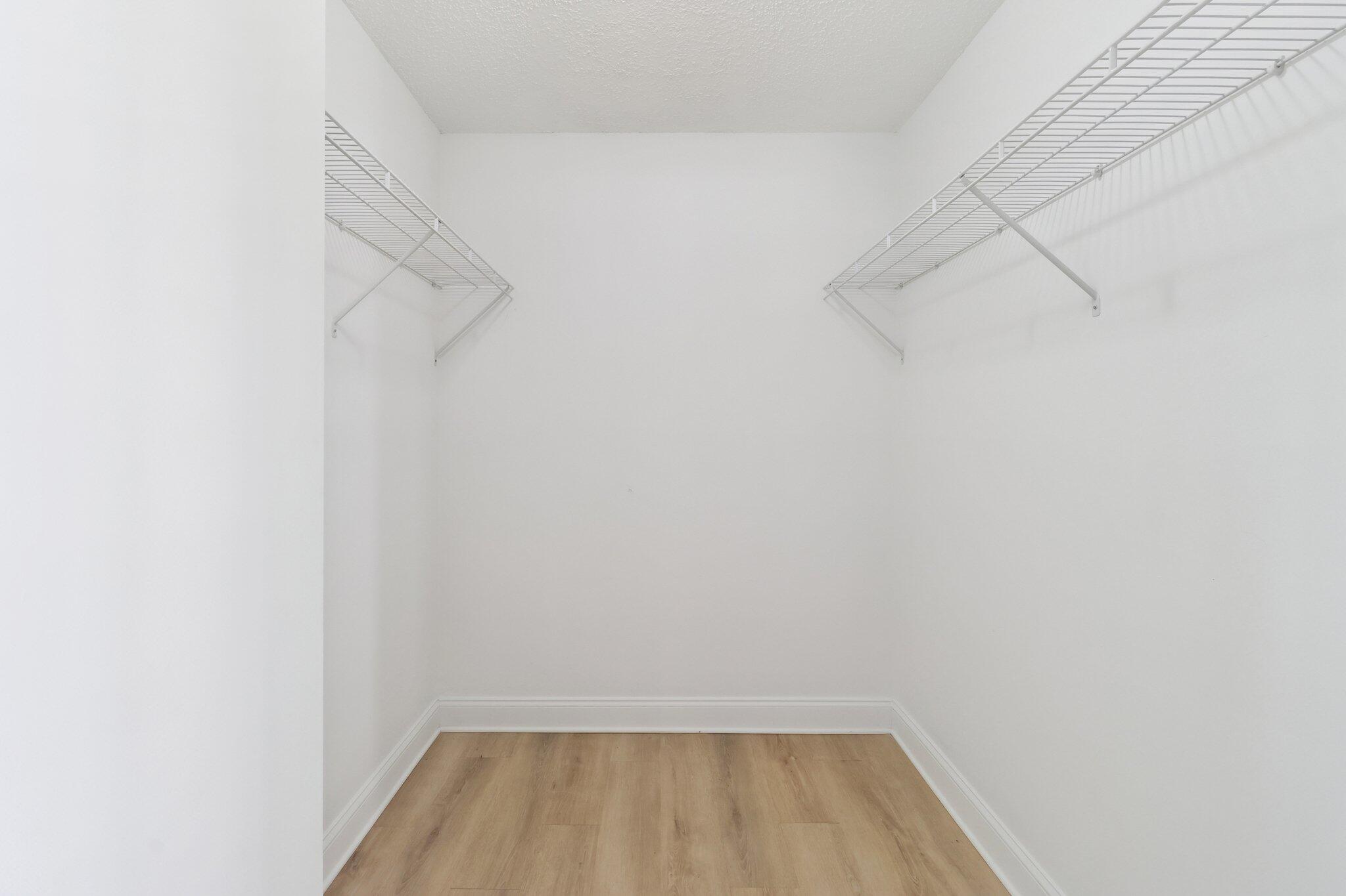 2500 Southeast Anchorage Cove, Unit D1 Port St. Lucie, FL 34952 - Photo 13 of 29 a view of a room with racks on the wall