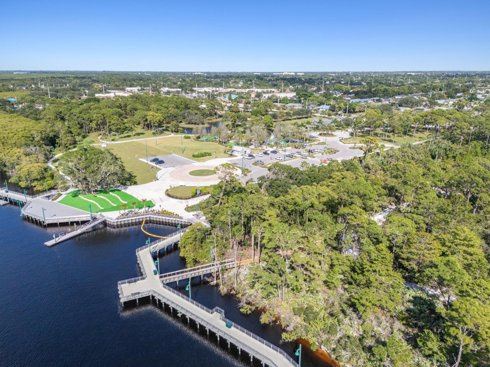 2500 Southeast Anchorage Cove, Unit D1 Port St. Lucie, FL 34952 - Photo 29 of 29 an aerial view of residential houses with outdoor space and trees