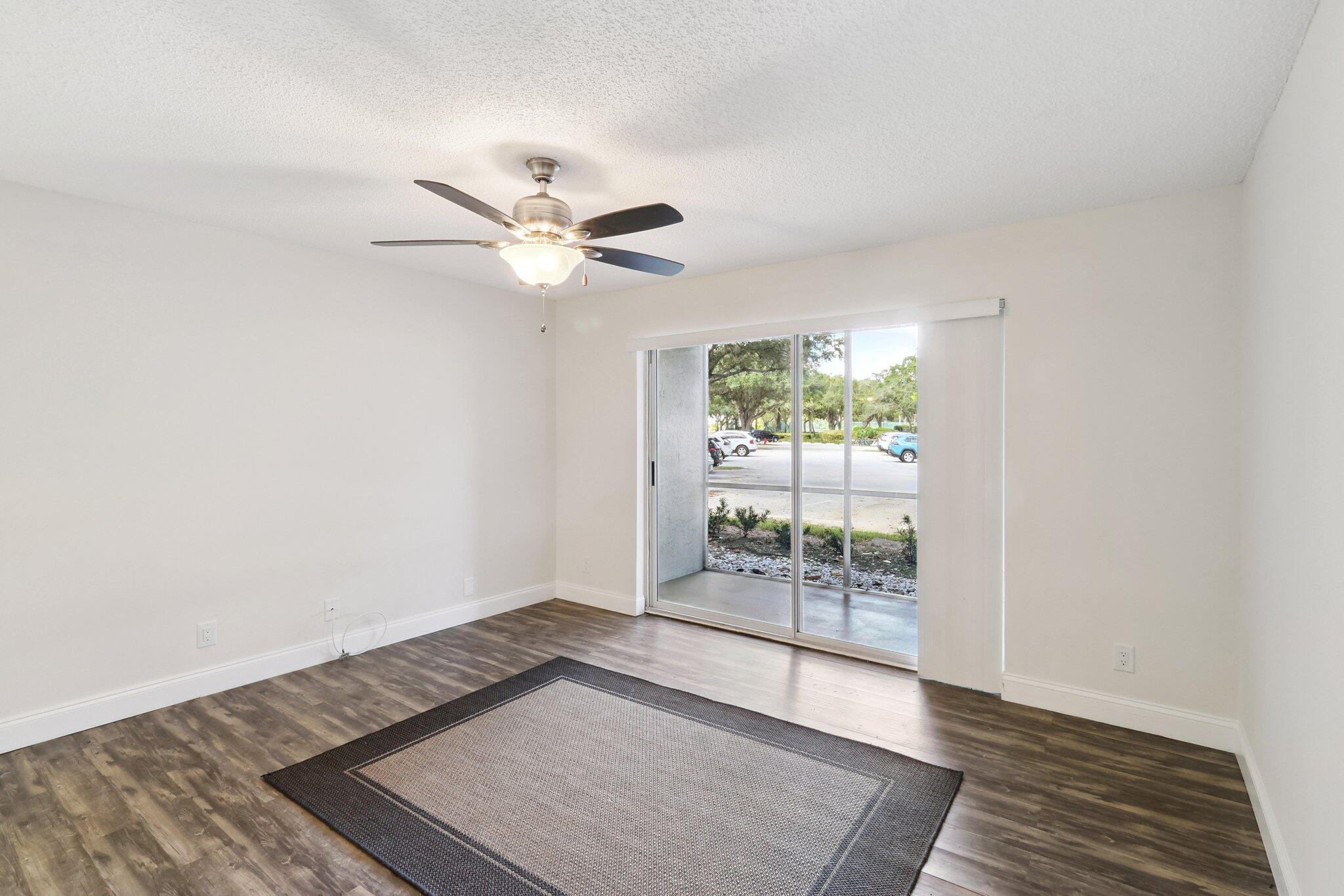 2500 Southeast Anchorage Cove, Unit D1 Port St. Lucie, FL 34952 - Photo 5 of 29 a view of an empty room with a window