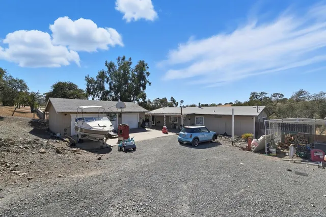 a view of a terrace with sitting area