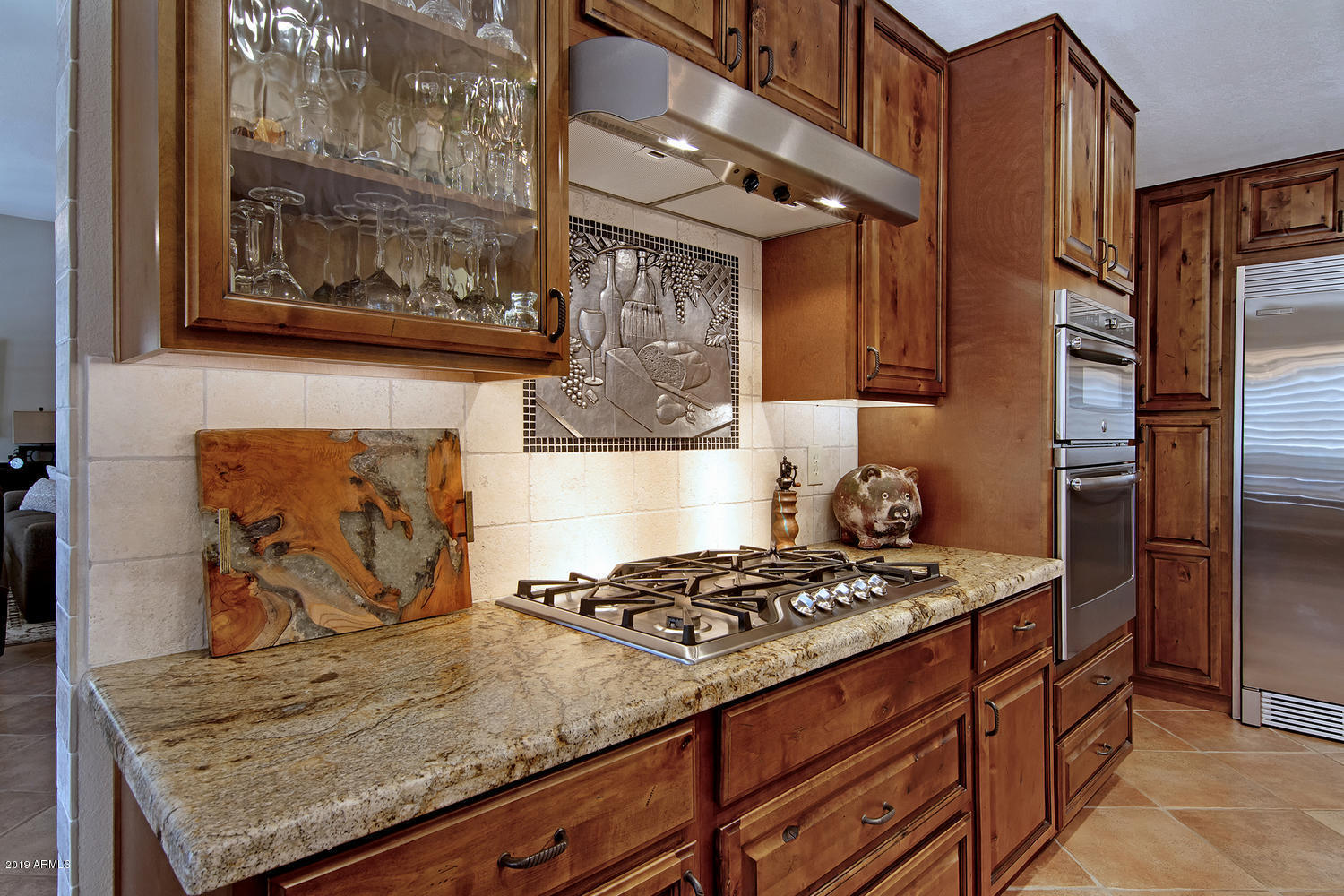 19009 East Wiki Way Rio Verde, AZ 85263 - Photo 15 of 55 a kitchen with a stove and a refrigerator