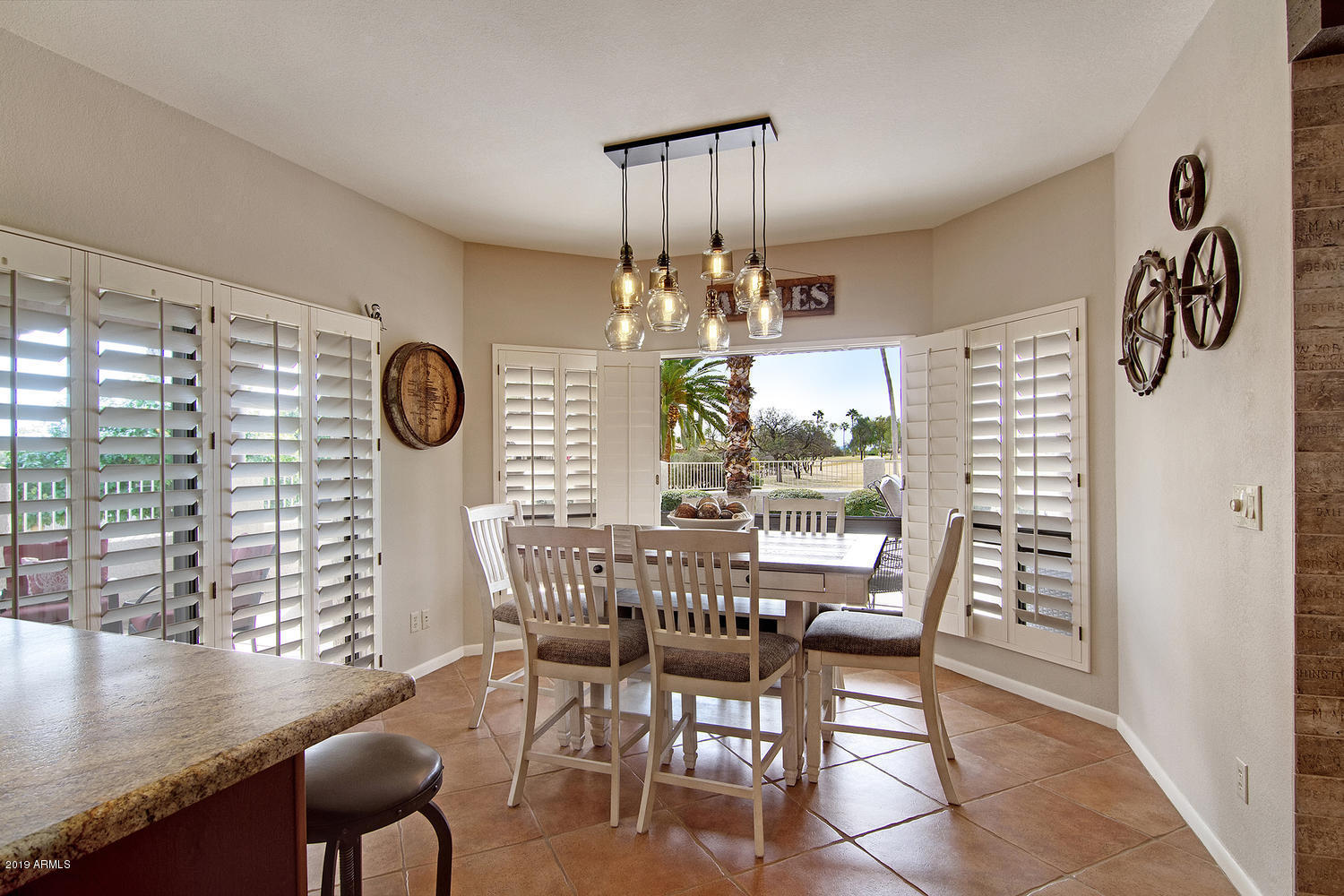 19009 East Wiki Way Rio Verde, AZ 85263 - Photo 16 of 55 a view of a dining room with furniture and chandelier