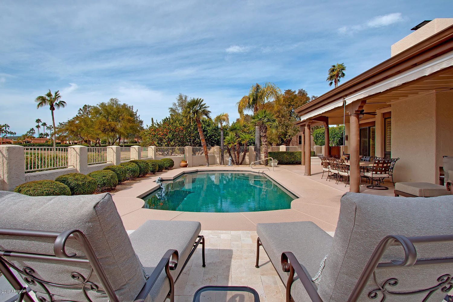 19009 East Wiki Way Rio Verde, AZ 85263 - Photo 38 of 55 a view of a swimming pool with a patio