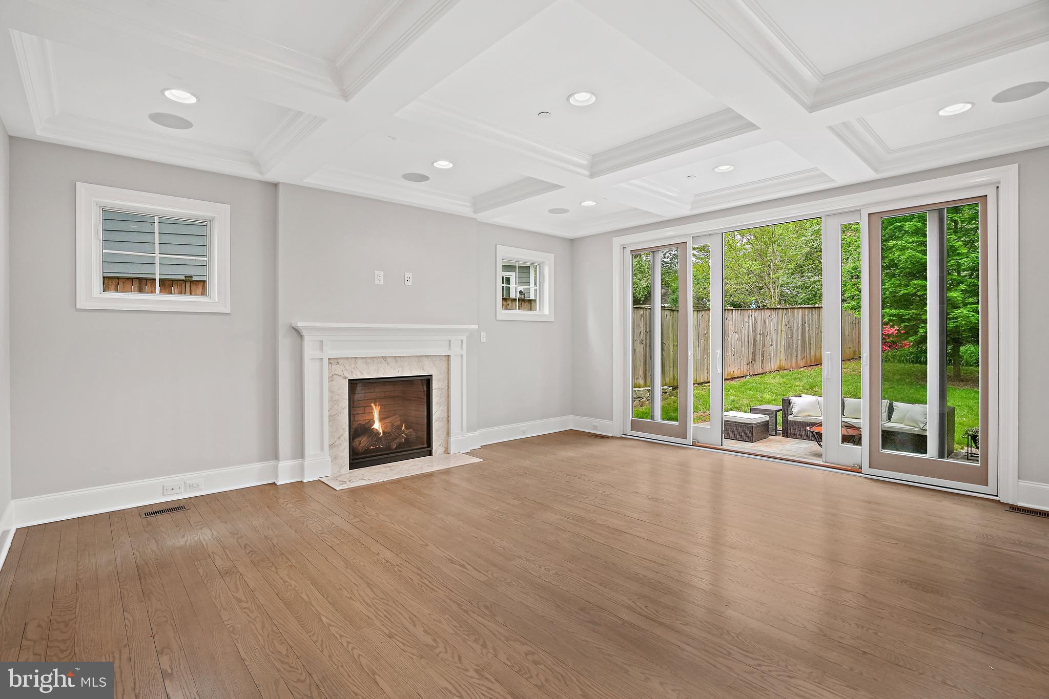 5510 Northfield Road Bethesda, MD 20817 - Photo 28 of 125 Family Room with gas fireplace & coffered ceiling