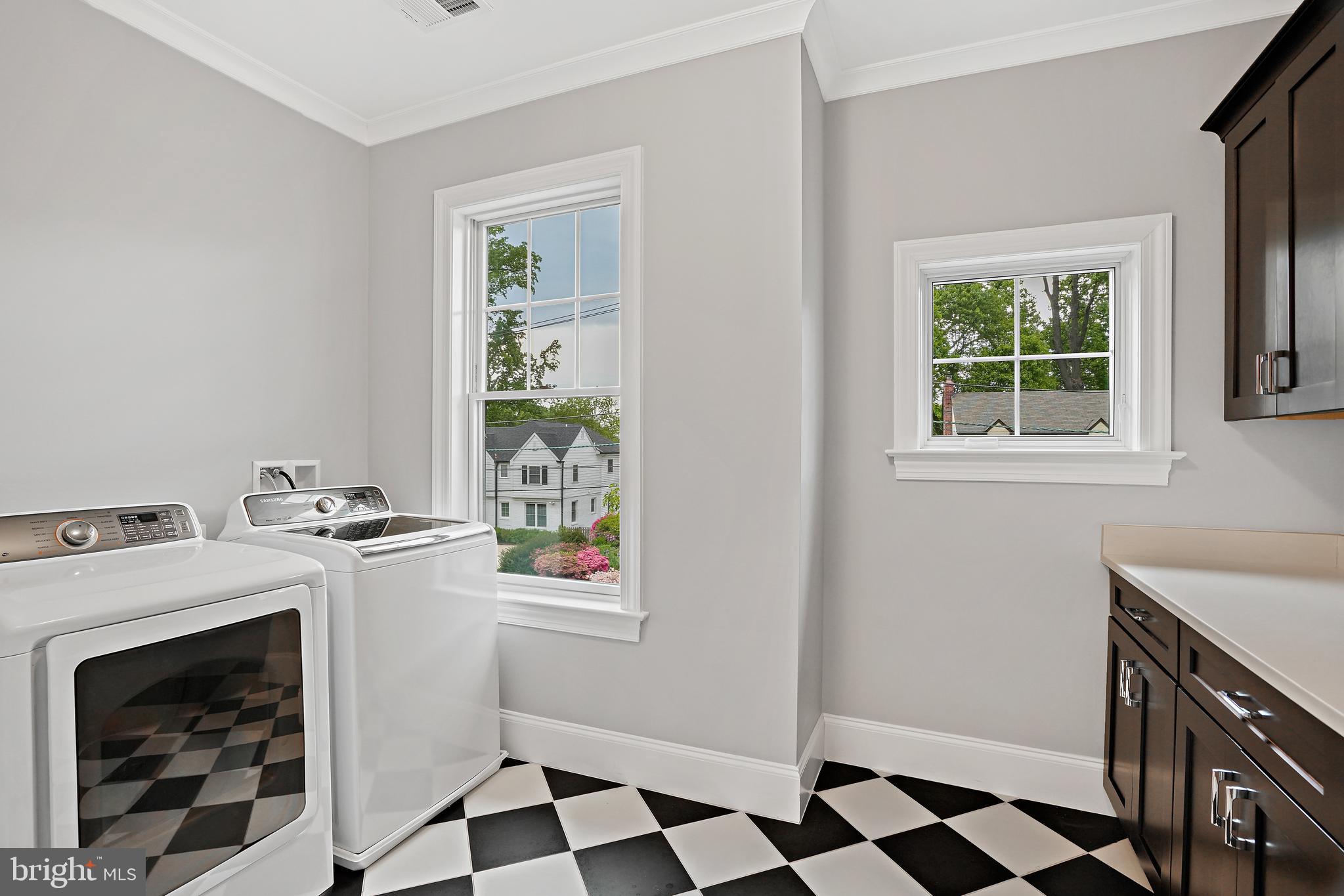 5510 Northfield Road Bethesda, MD 20817 - Photo 67 of 125 Laundry w custom cabinetry, sink, W&D