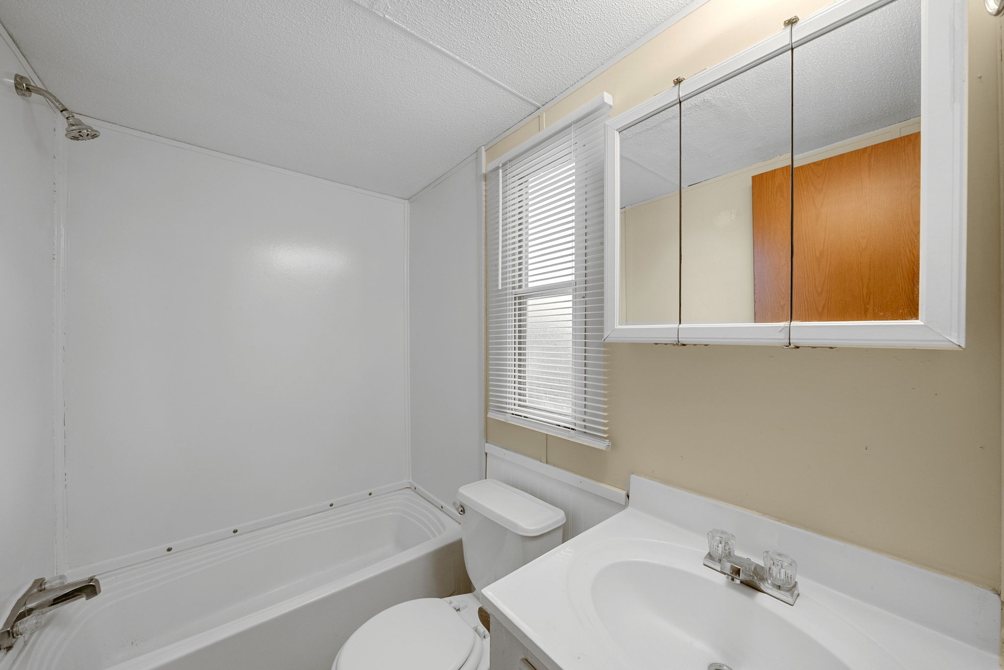 1845 Evans Road Clarksville, TN 37042 - Photo 23 of 26 a bathroom with a bathtub shower sink vanity and toilet