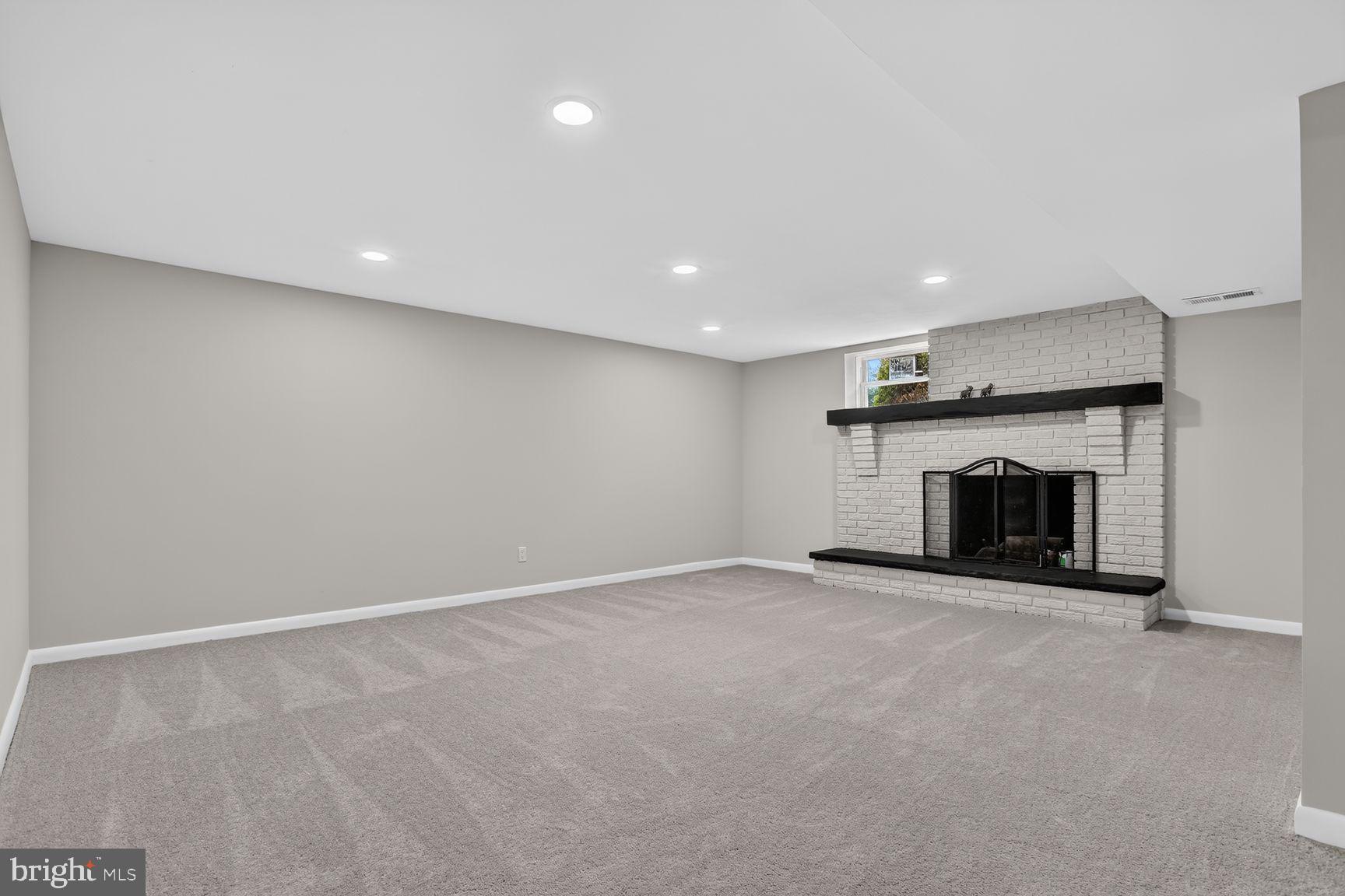 4774 Byron Road Baltimore, MD 21244 - Photo 17 of 21 Spacious, modern basement retreat.