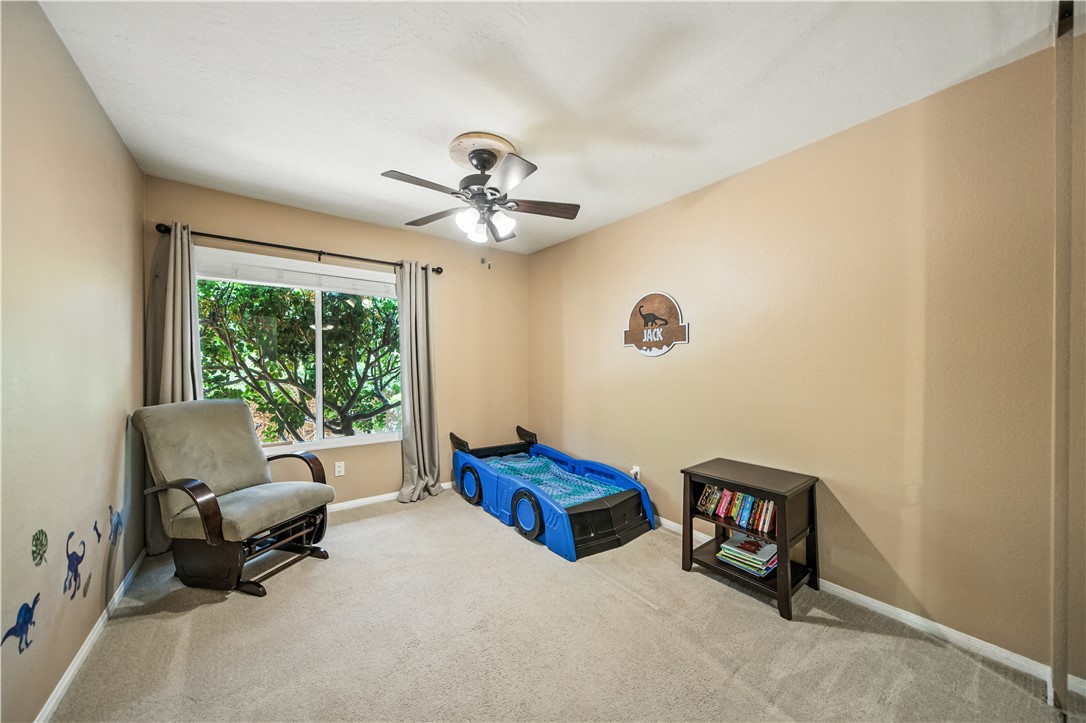 2113 David Drive Escondido, CA 92026 - Photo 31 of 46 a living room with furniture gym equipment and a large window