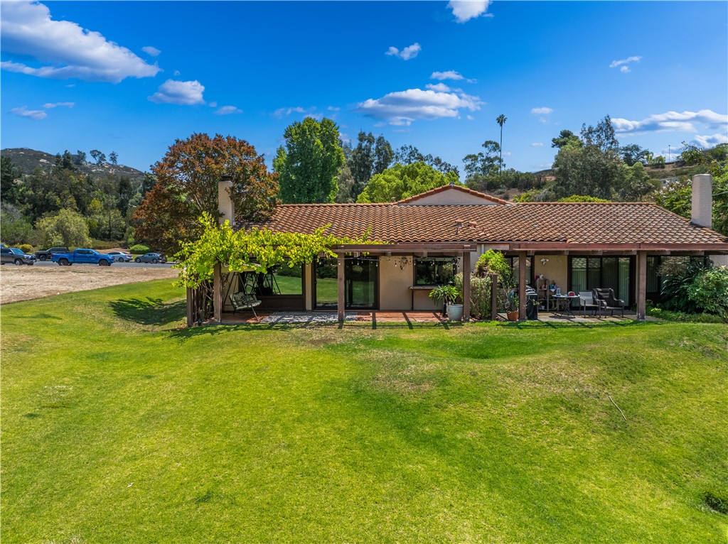 2113 David Drive Escondido, CA 92026 - Photo 40 of 46 a view of a house with a yard