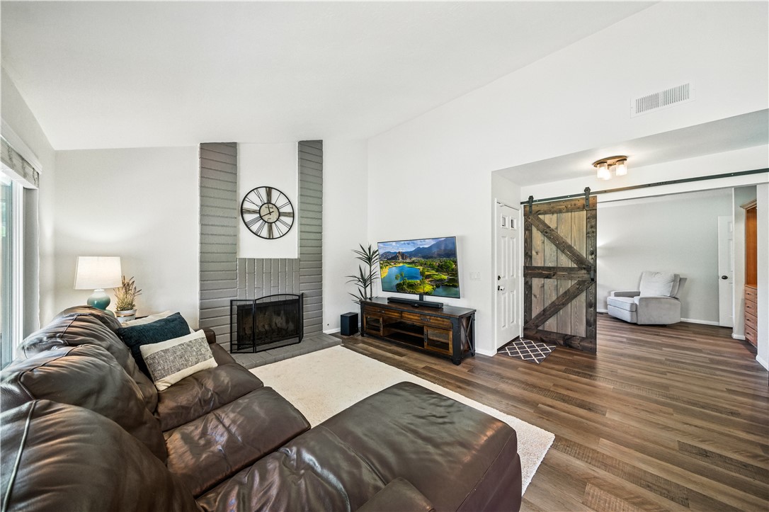 2113 David Drive Escondido, CA 92026 - Photo 6 of 46 a living room with furniture and a fireplace