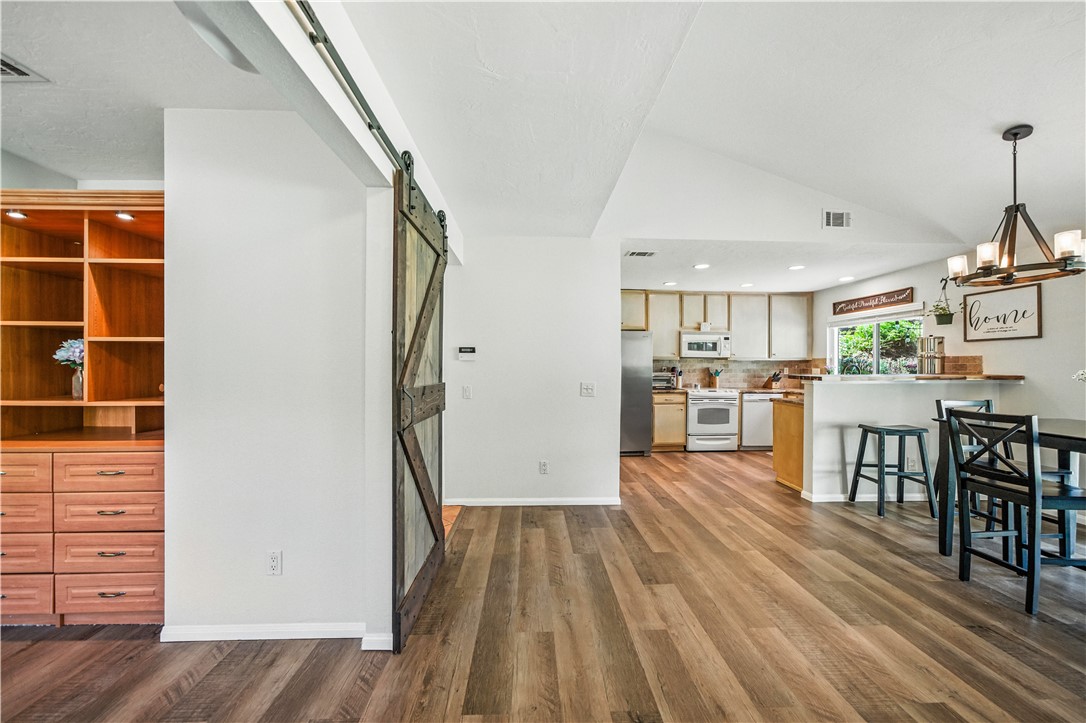 2113 David Drive Escondido, CA 92026 - Photo 9 of 46 a view of kitchen with furniture and wooden floor