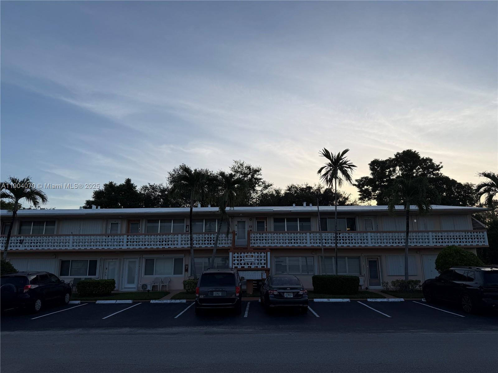815 Southwest 10th Terrace, Unit 15V Hallandale Beach, FL 33009 - Photo 6 of 6 a view of a car parked in the road