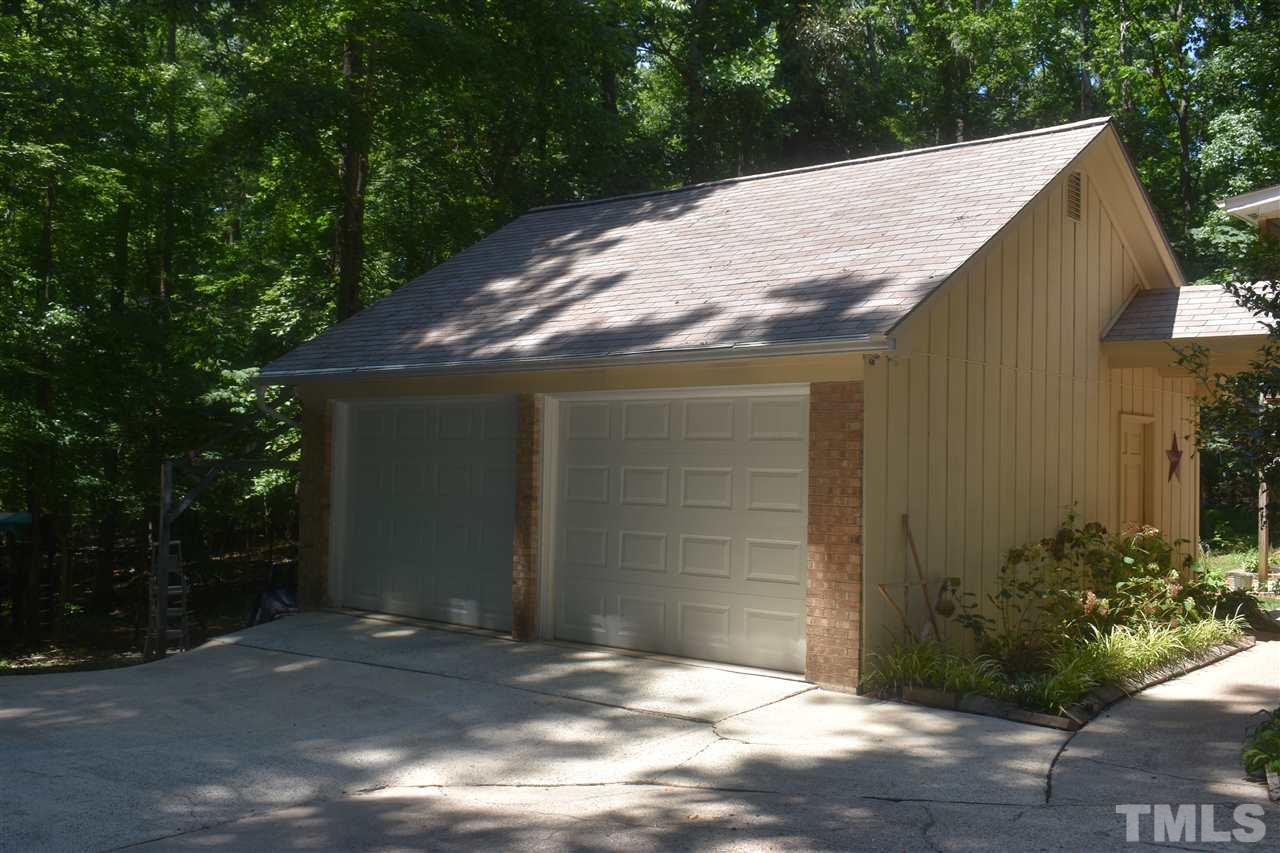 9621 Rock Creek Road Raleigh, NC 27613 - Photo 11 of 15 a backyard of a house