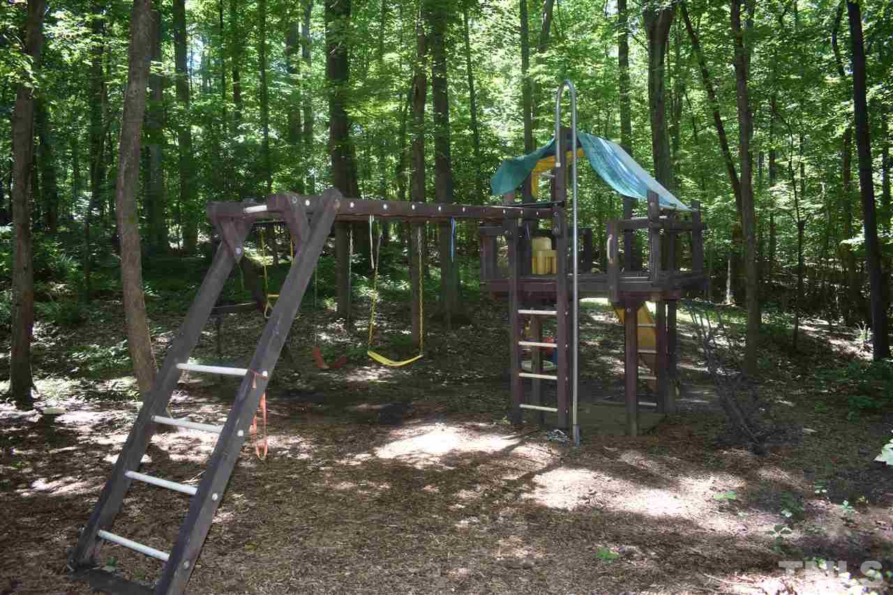 9621 Rock Creek Road Raleigh, NC 27613 - Photo 13 of 15 a view of outdoor space and yard