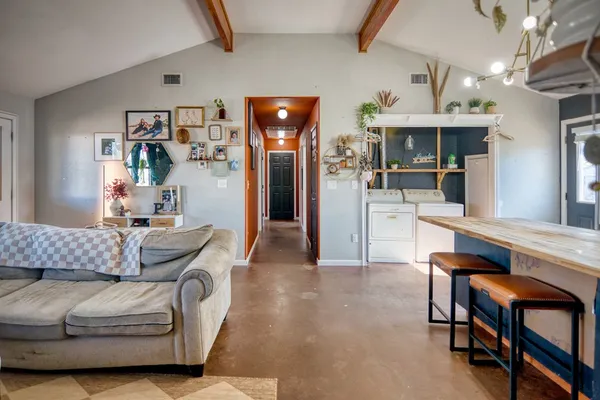 a living room with furniture and a couch