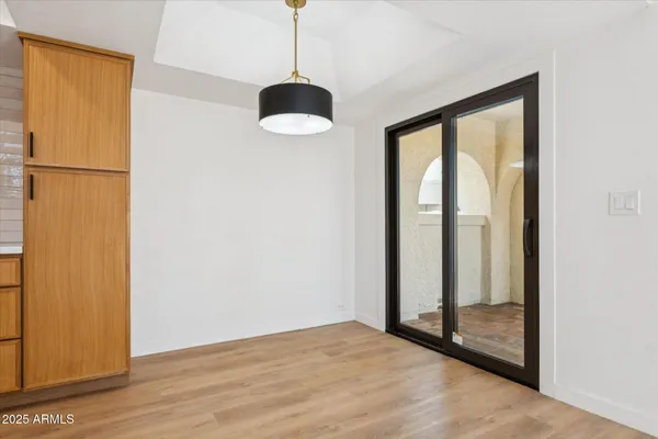 a bathroom with a sink vanity and a mirror
