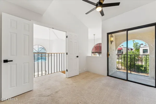 a view of a house with a flower garden