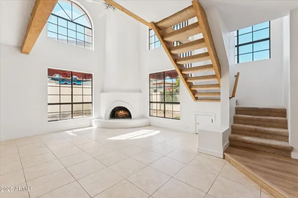 a view of a kitchen with a sink and cabinets