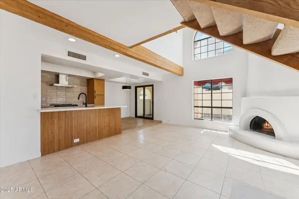 a kitchen with a stove and a refrigerator