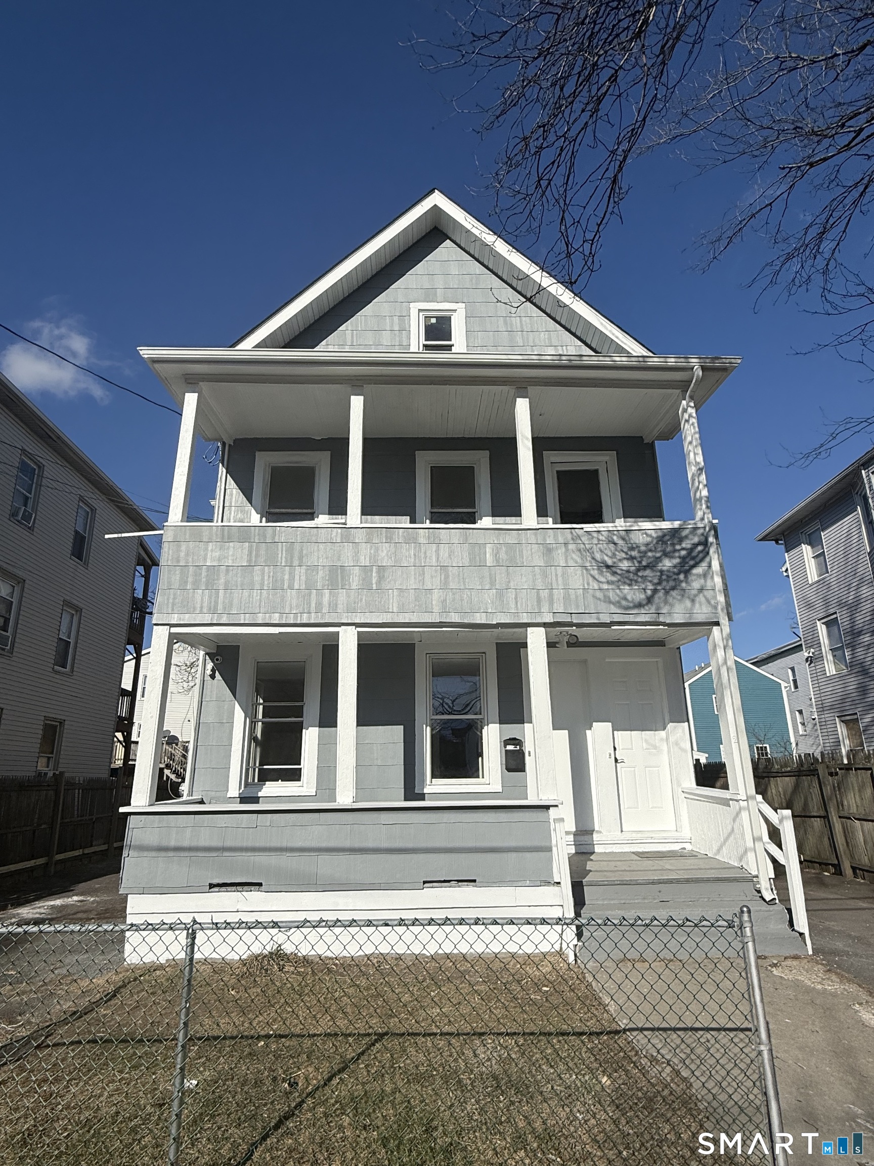 a front view of a house with a porch