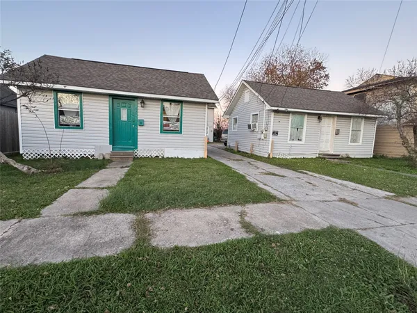 front view of a house and a yard