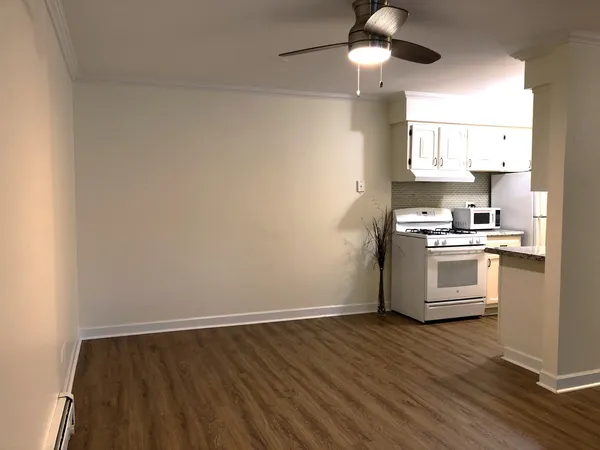 a kitchen with stainless steel appliances granite countertop a stove and a sink