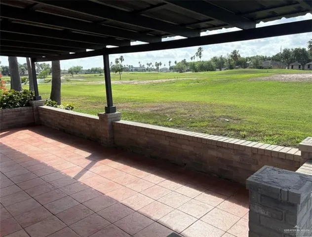 a view of swimming pool from a balcony
