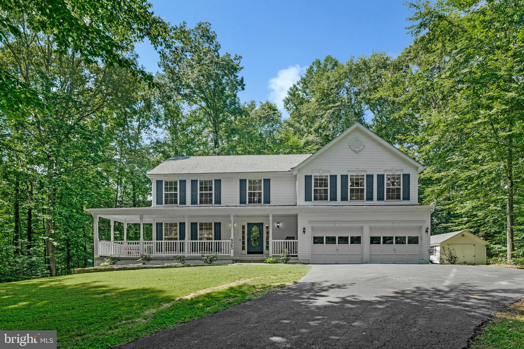 6265 Happy Creek Road Manassas, VA 20112 - Photo 2 of 50 Charming home nestled in serene woodlands.