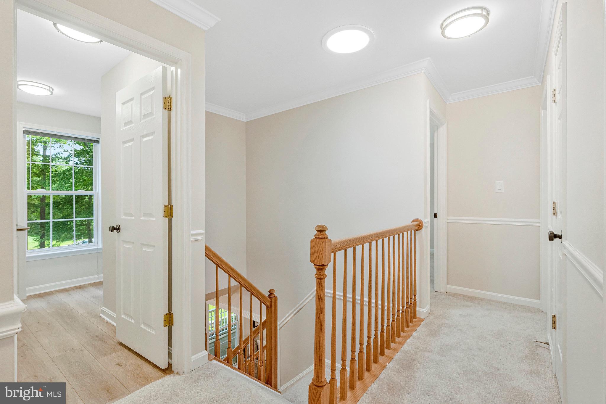 6265 Happy Creek Road Manassas, VA 20112 - Photo 23 of 50 Upper Level Hallway and Laundry Room