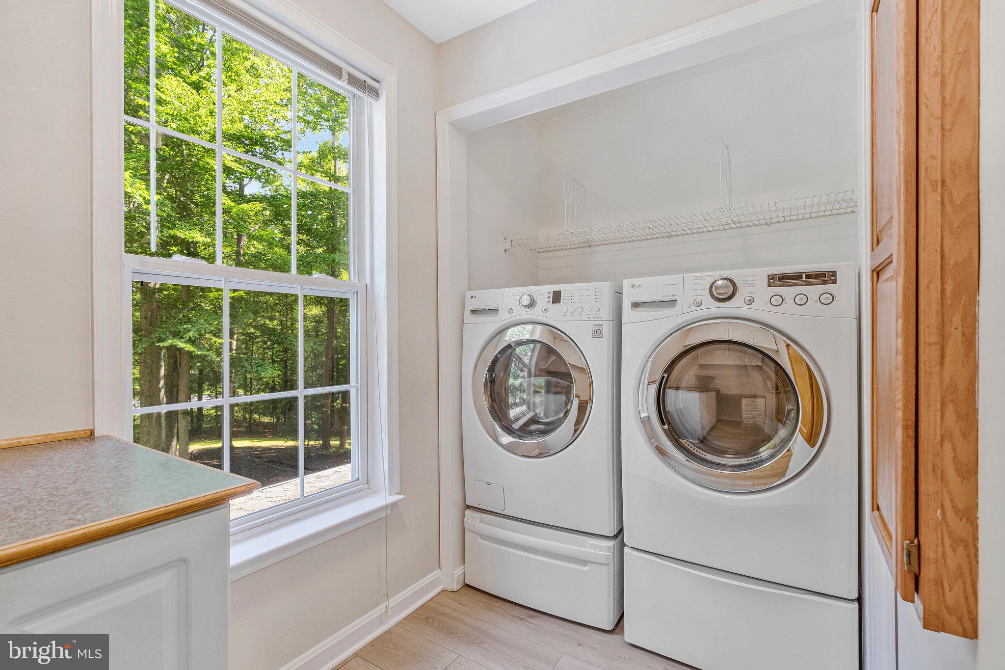 6265 Happy Creek Road Manassas, VA 20112 - Photo 24 of 50 Bright laundry nook with serene views. Upper Level