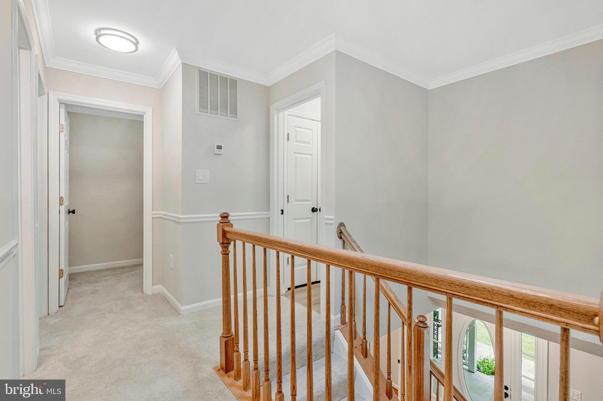6265 Happy Creek Road Manassas, VA 20112 - Photo 31 of 50 Bright and inviting upper hallway retreat.