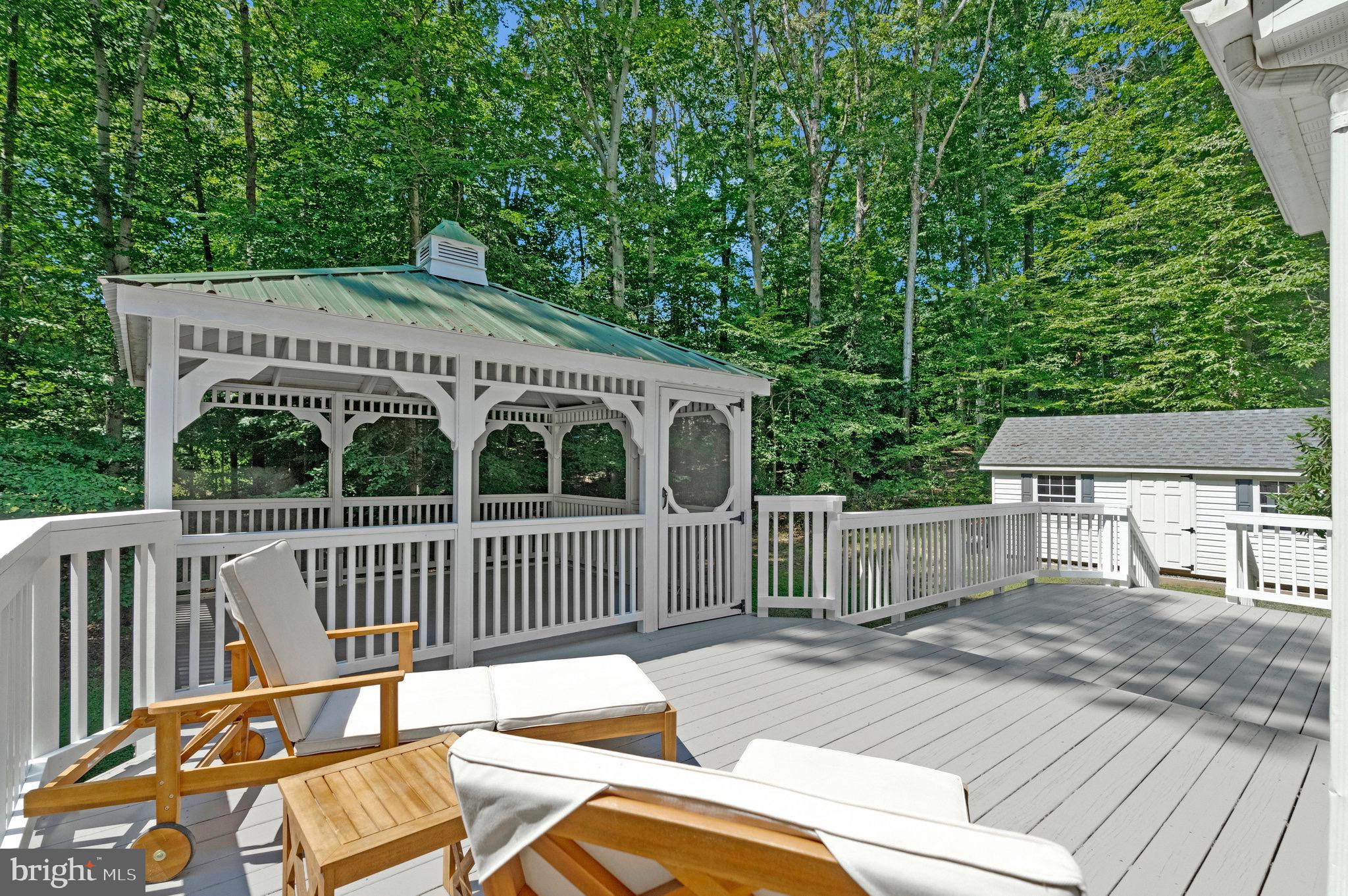 6265 Happy Creek Road Manassas, VA 20112 - Photo 40 of 50 Serene gazebo nestled in lush greenery.
