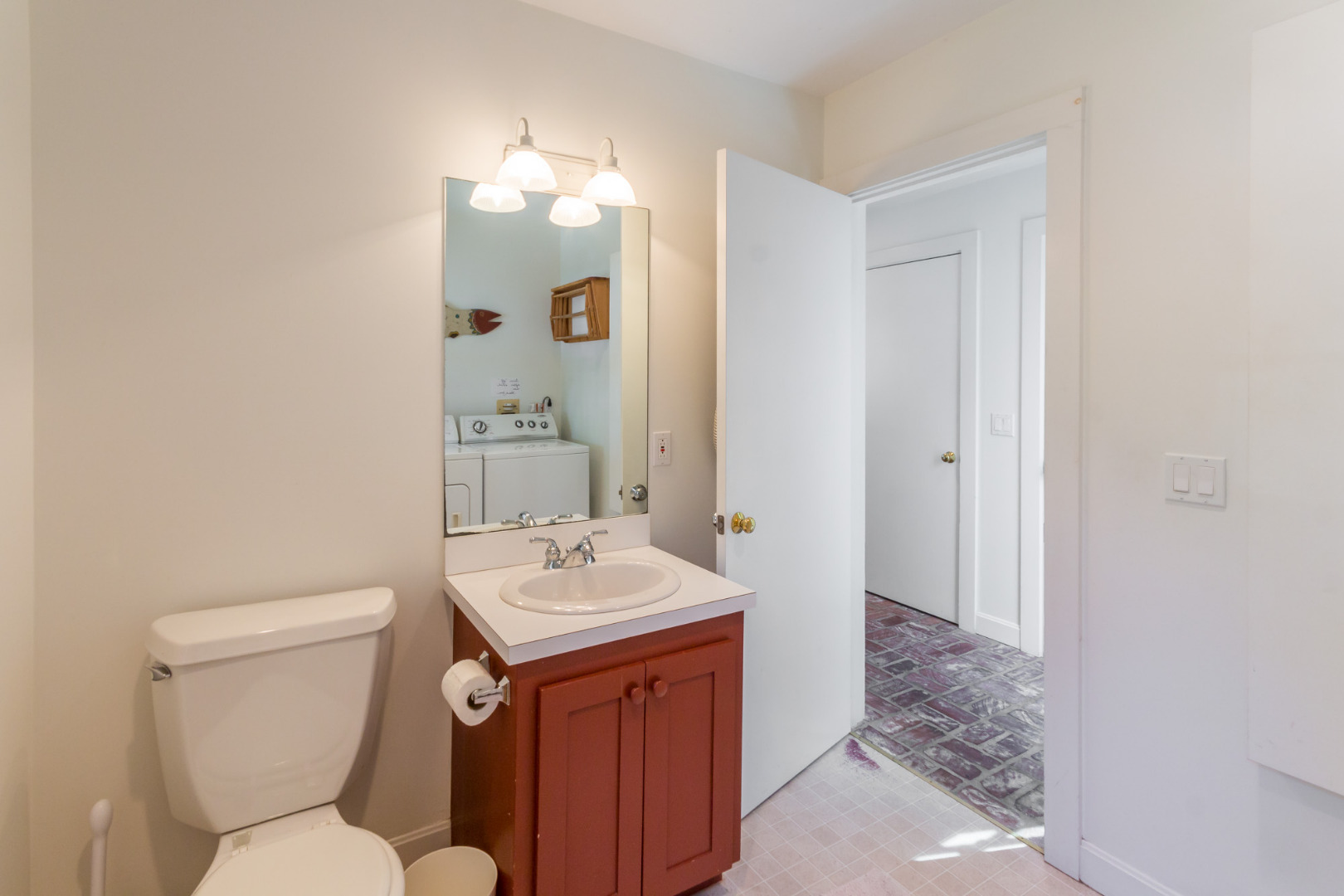 87 Peases Point Way Edgartown, MA 02539 - Photo 17 of 21 Half bath and laundry room off hall on 1st floor