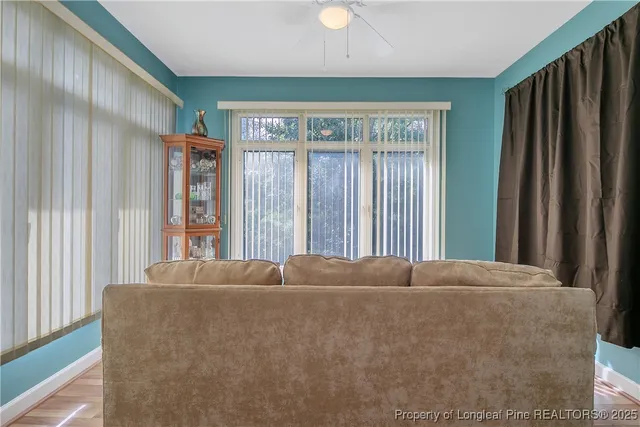 a view of a livingroom with a balcony