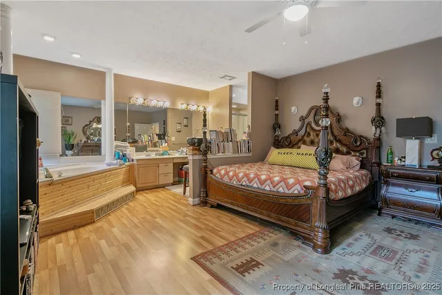 a bed room with a bed and window