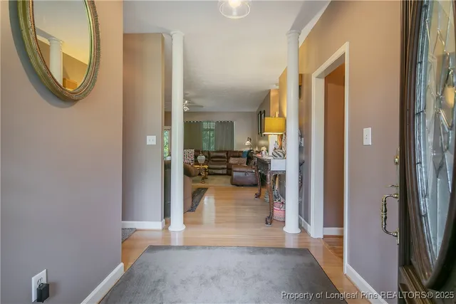 a view of a livingroom with furniture and a livingroom